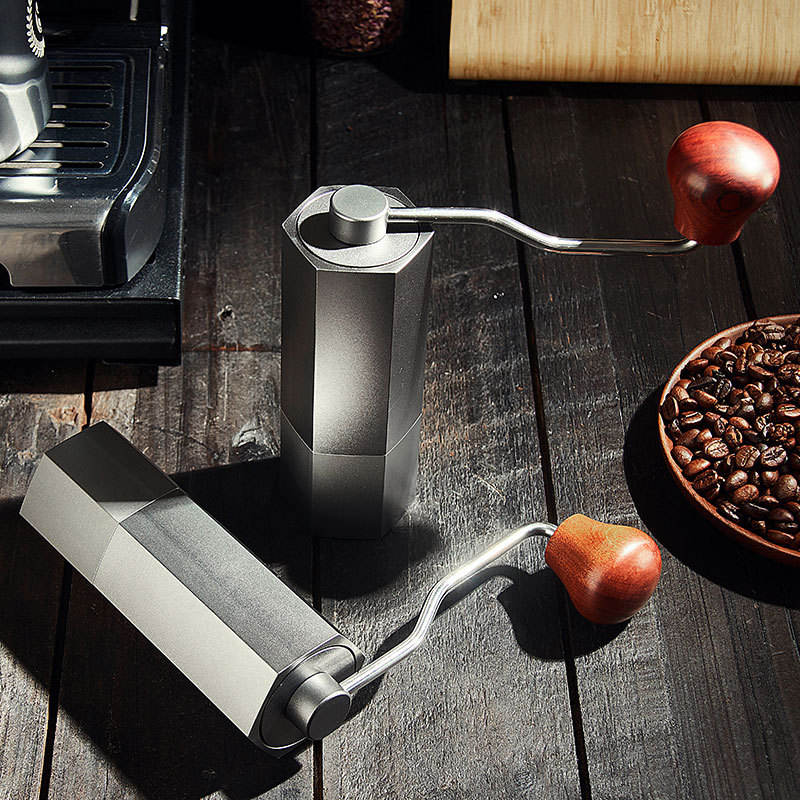 Moulin à café manuel en acier inoxydable avec réglage réglable en aluminium d'aviation